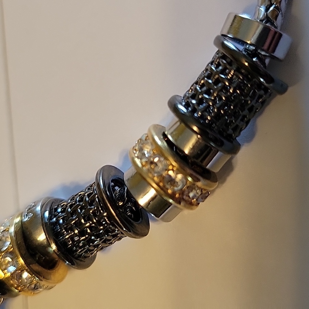 Silver chain with silver, gold, hematite & crystal beads adorn this bracelet - Picture 2 of 6